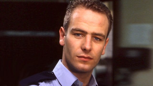Robson Green as Jimmy Powell in Casualty, with his blue porters uniform